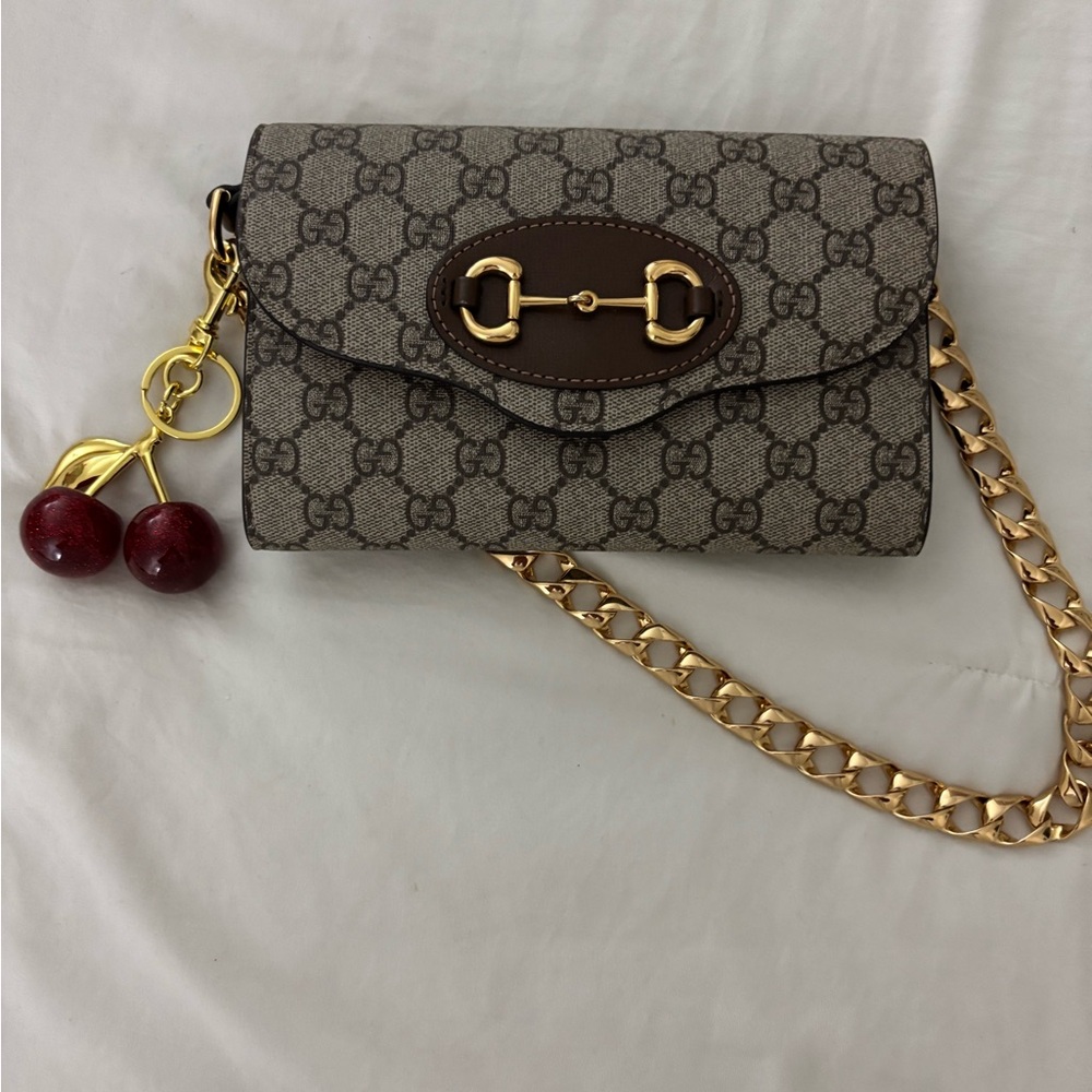 Gucci Brown and Gold Clutch with Monogram Design